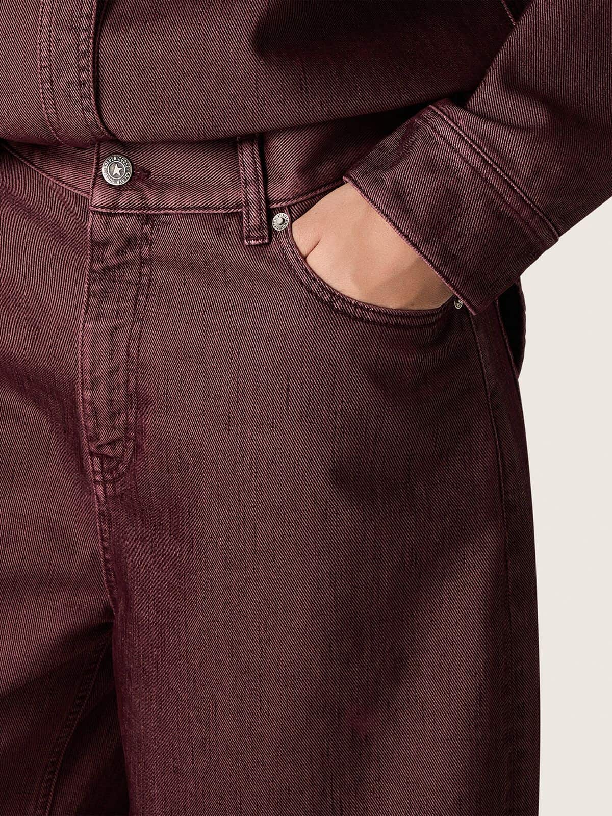 Women's jeans in burgundy denim