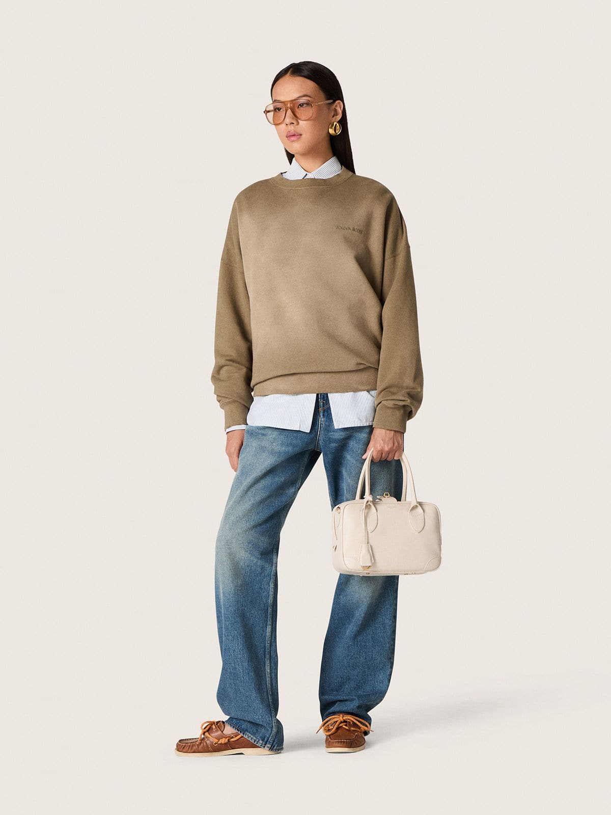 Golden women's boyfriend jeans in stone-washed light blue denim