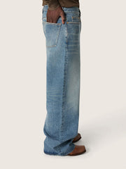 Golden women's boyfriend jeans in stone-washed light blue denim