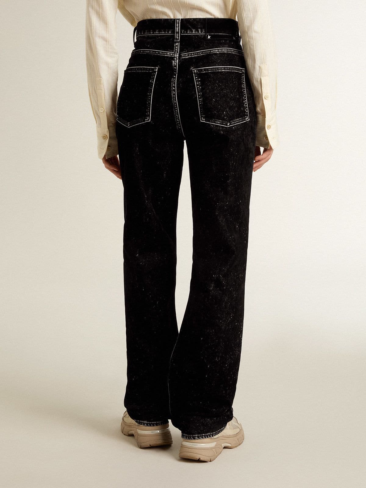Women's black jeans with a velvet-like wash effect