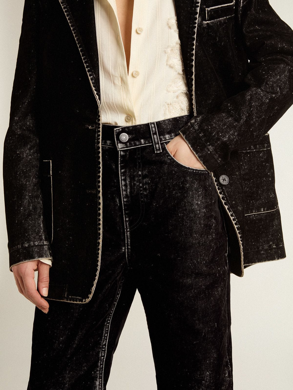 Women's black jeans with a velvet-like wash effect