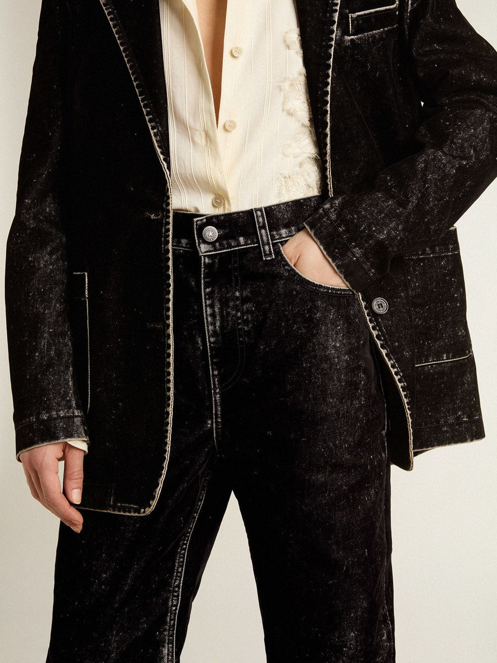 Women's black jeans with a velvet-like wash effect