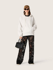 Women's tulle pants with floral embroidery in black sequins
