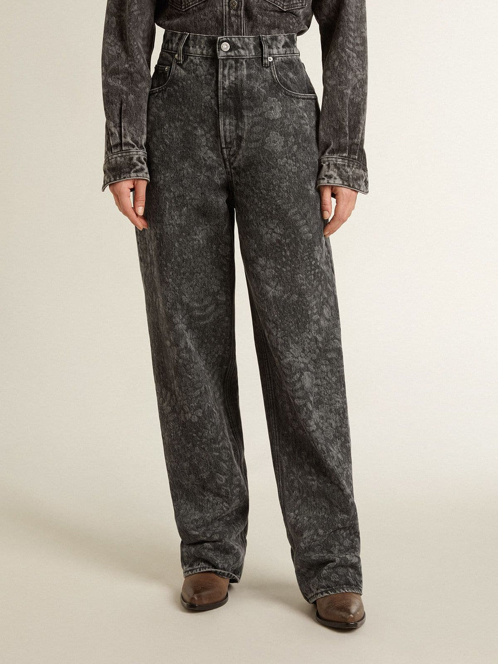 Women's black jeans with a floral motif