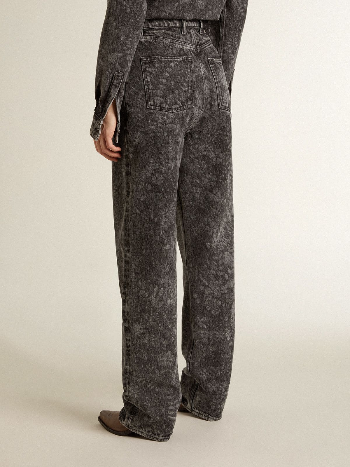 Women's black jeans with a floral motif