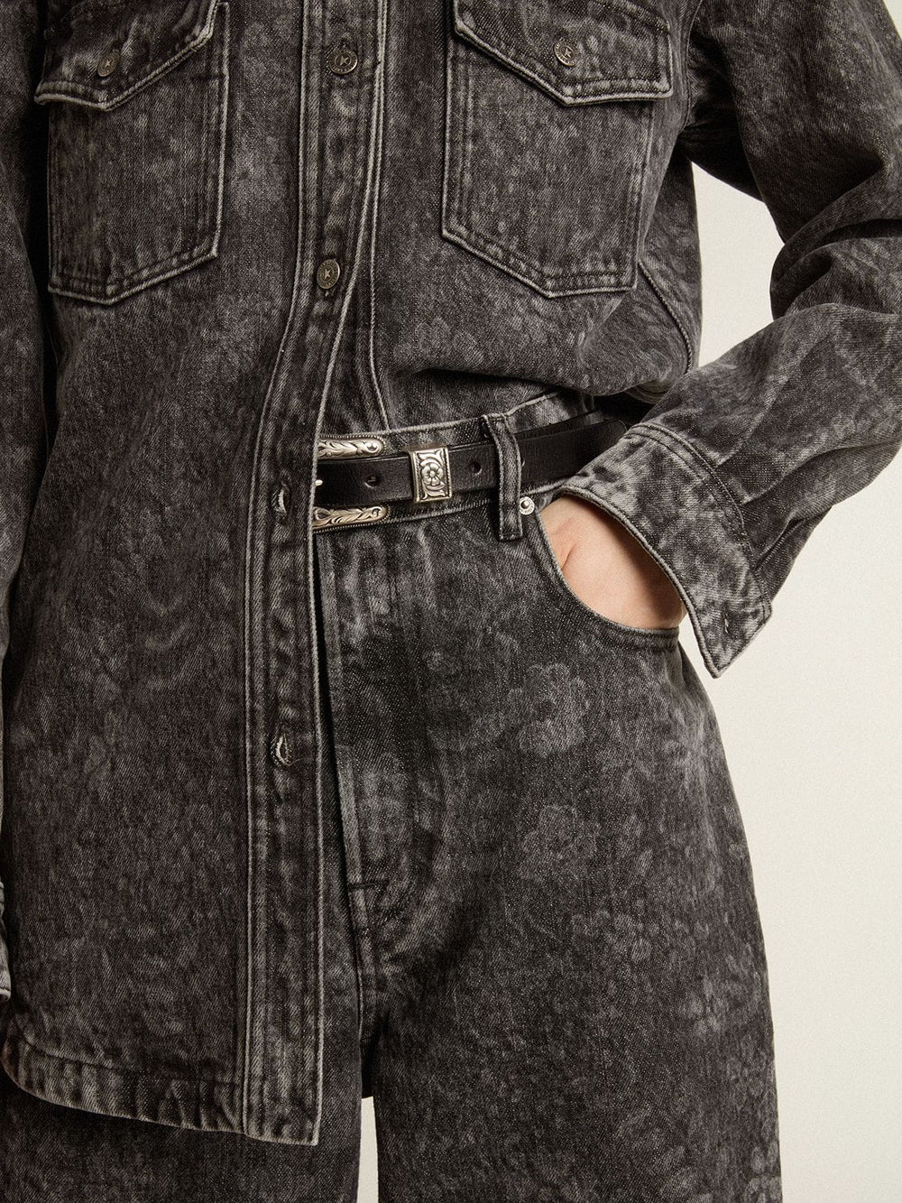 Women's black jeans with a floral motif