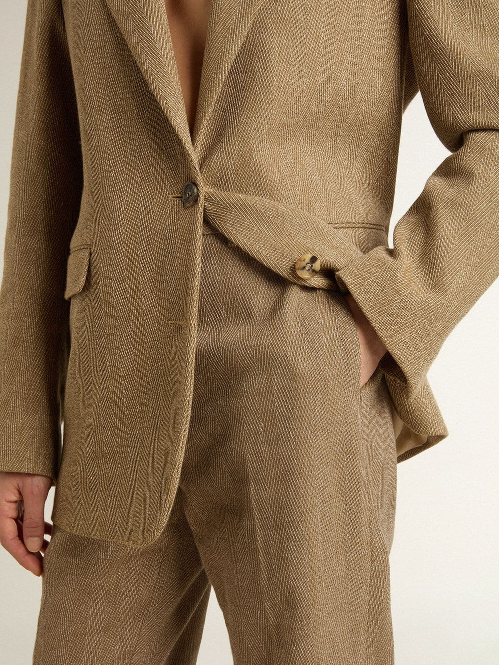 Women's trousers in a sand-colored herringbone linen blend