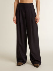 Women’s dark blue tailored trousers with vertical stripe