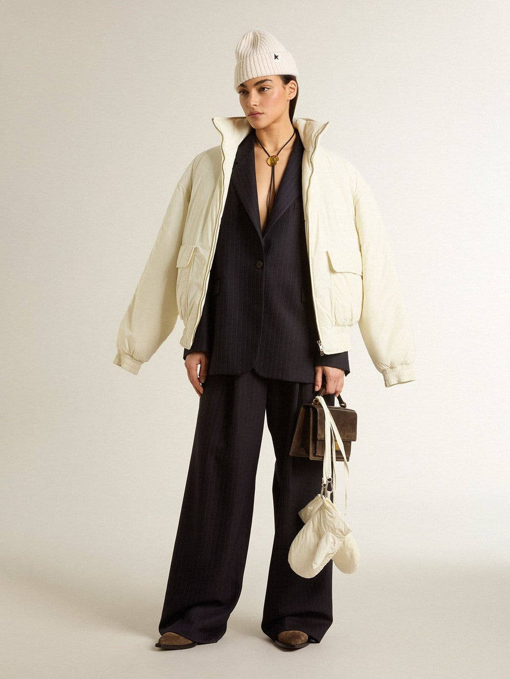 Women’s dark blue tailored trousers with vertical stripe