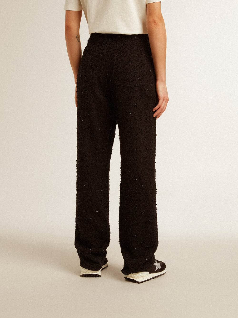 Women’s cotton denim pants with crystal and stone decoration