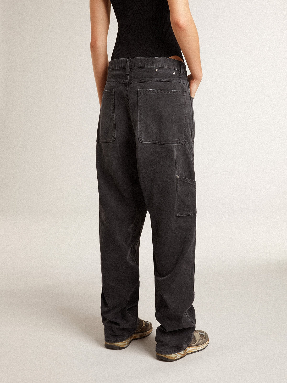 Women's distressed black cotton jeans with front patches