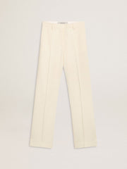 Women's loose pants in worn-white tailored fabric