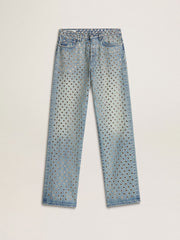 Women's washed jeans with all-over eyelets