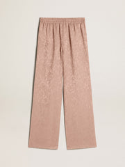 Women's pink viscose pants with floral pattern