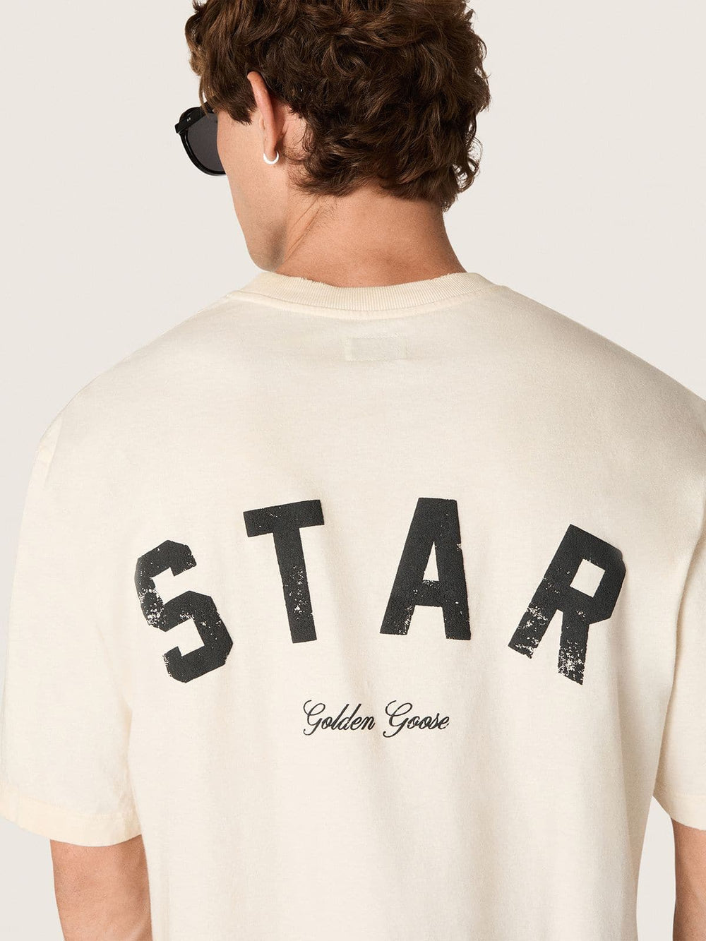 Star unisex cotton T-shirt in vintage white with black print on the back