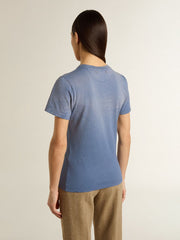 Women's faded light blue T-shirt with print on the chest