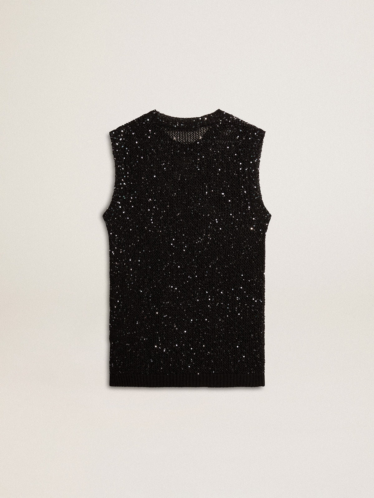 Black mesh knit top with sequins and contrasting details