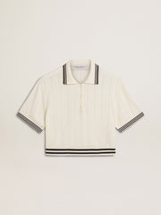 Women's cropped worn-white cotton polo shirt with blue ribbing