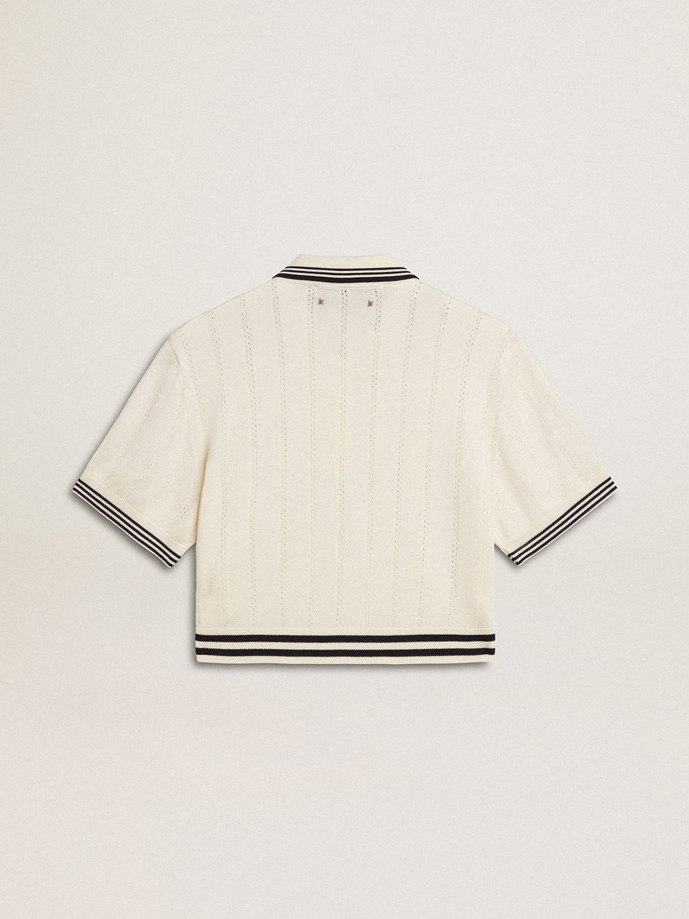 Women's cropped worn-white cotton polo shirt with blue ribbing