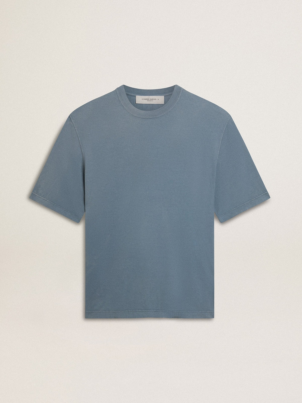 Unisex cotton T-shirt in baby blue with reverse print on the back