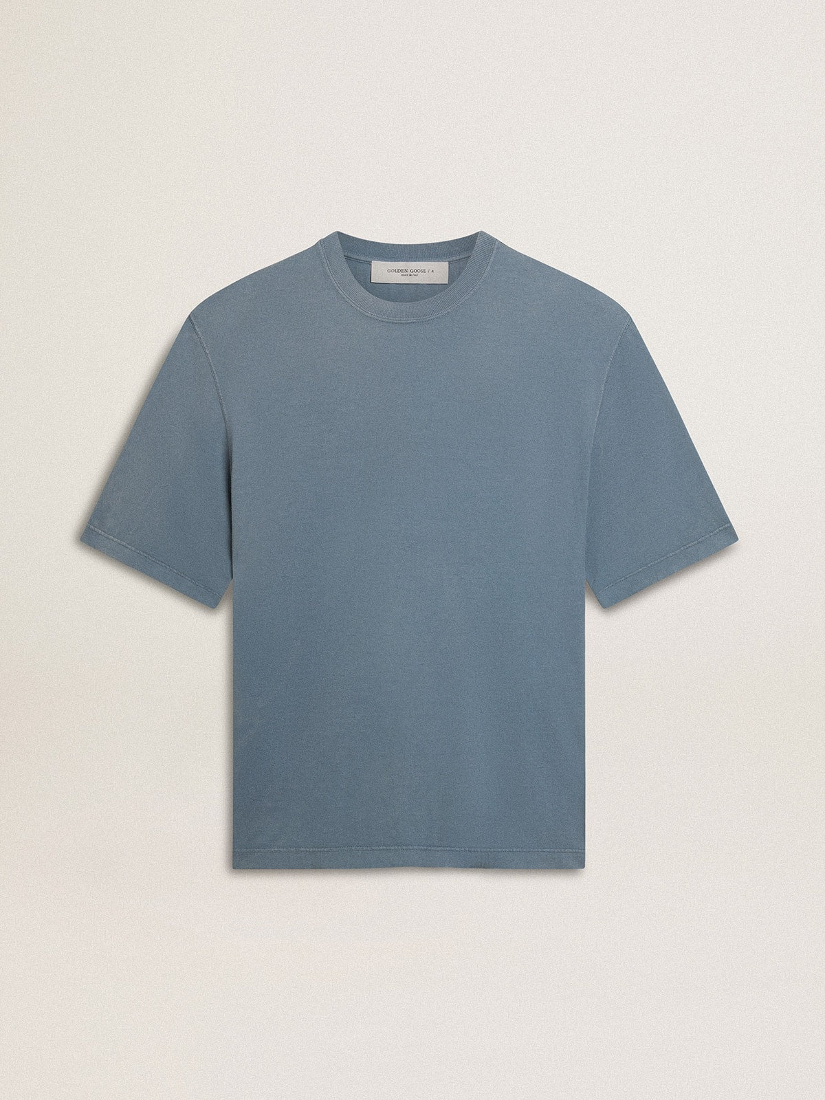 Unisex cotton T-shirt in baby blue with reverse print on the back