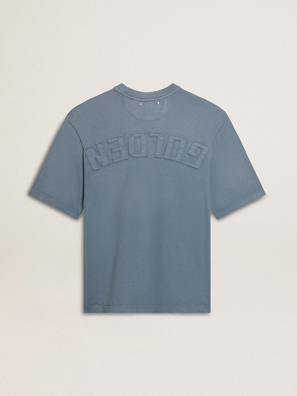 Unisex cotton T-shirt in baby blue with reverse print on the back