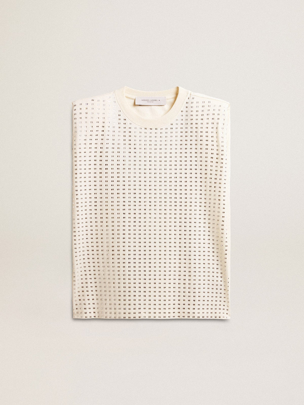 Aged white sleeveless T-shirt embellished with crystals