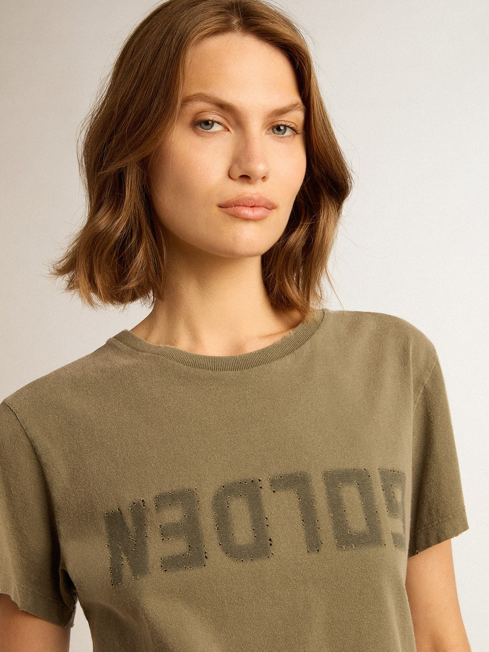 Women's olive green T-shirt with Golden lettering