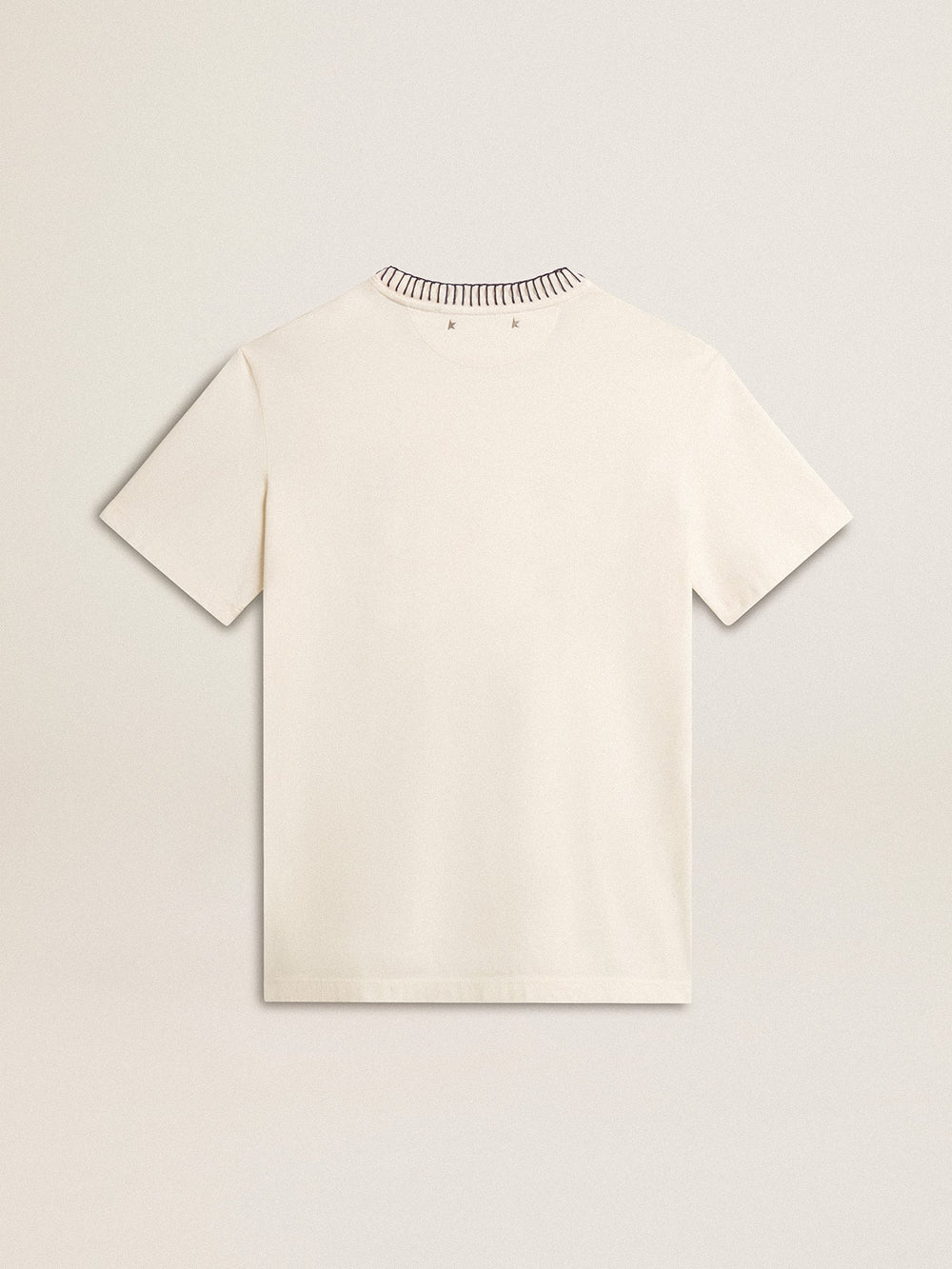 Women's aged white cotton T-shirt with hand embroidery