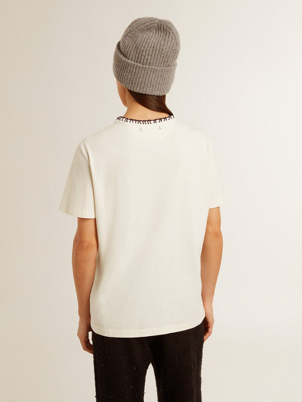 Women's aged white cotton T-shirt with hand embroidery