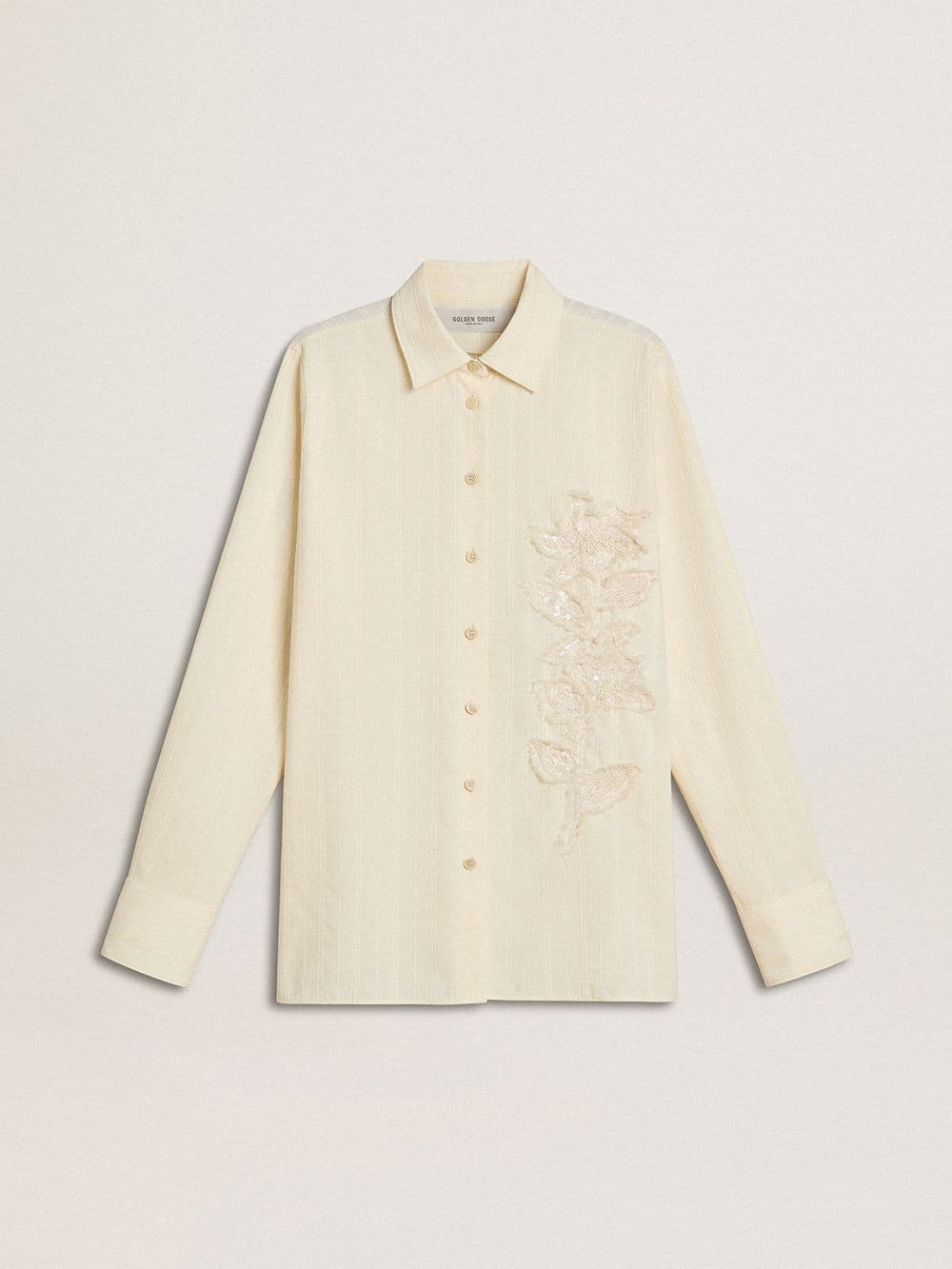 Women's cream-colored cotton shirt with floral embroidery