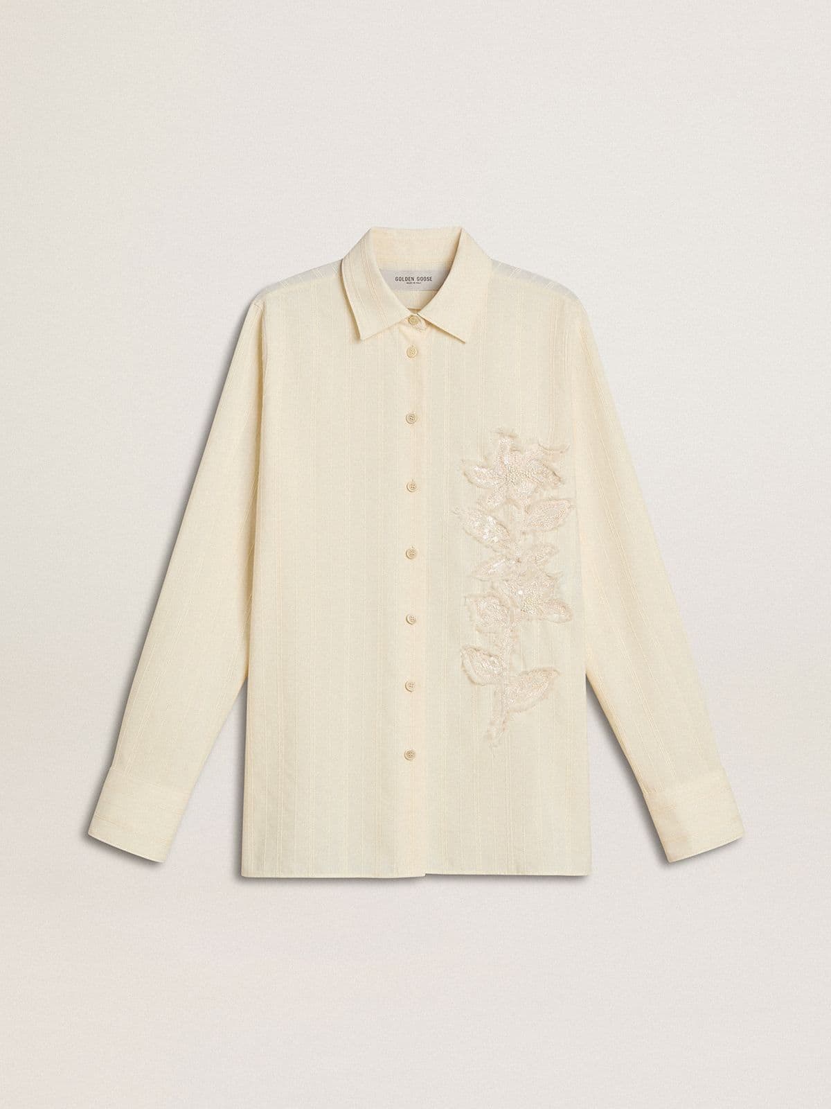 Women's cream-colored cotton shirt with floral embroidery