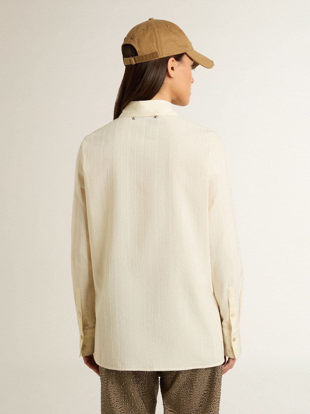 Women's cream-colored cotton shirt with floral embroidery
