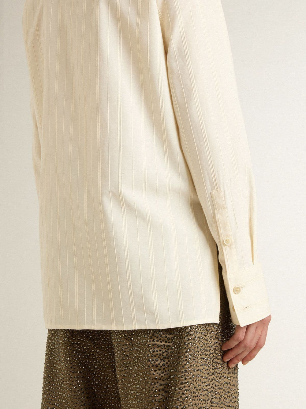 Women's cream-colored cotton shirt with floral embroidery