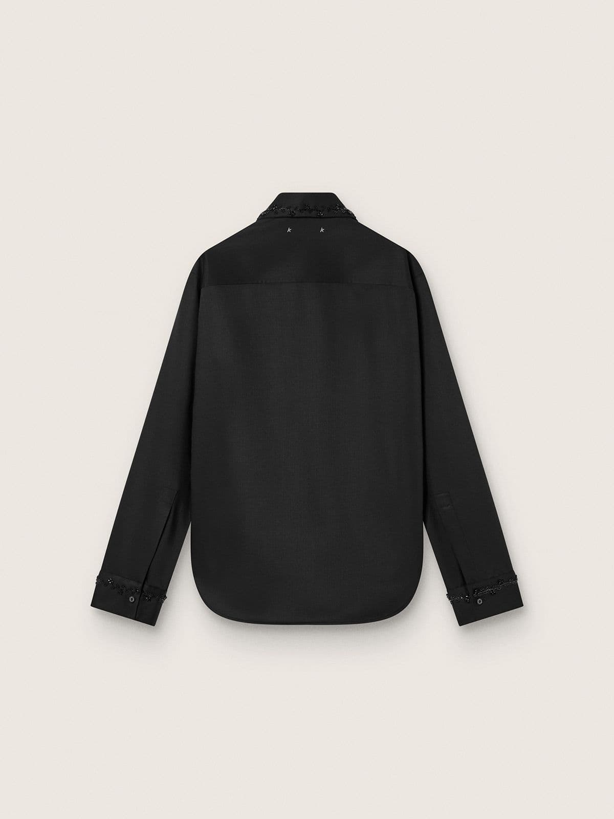 Women's shirt in black wool twill with floral embroidery in glass beads