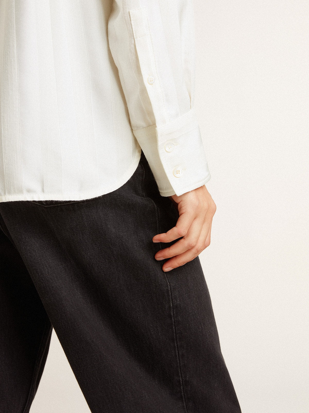 Women's shirt with a vertical striped pattern and crystal embroidery