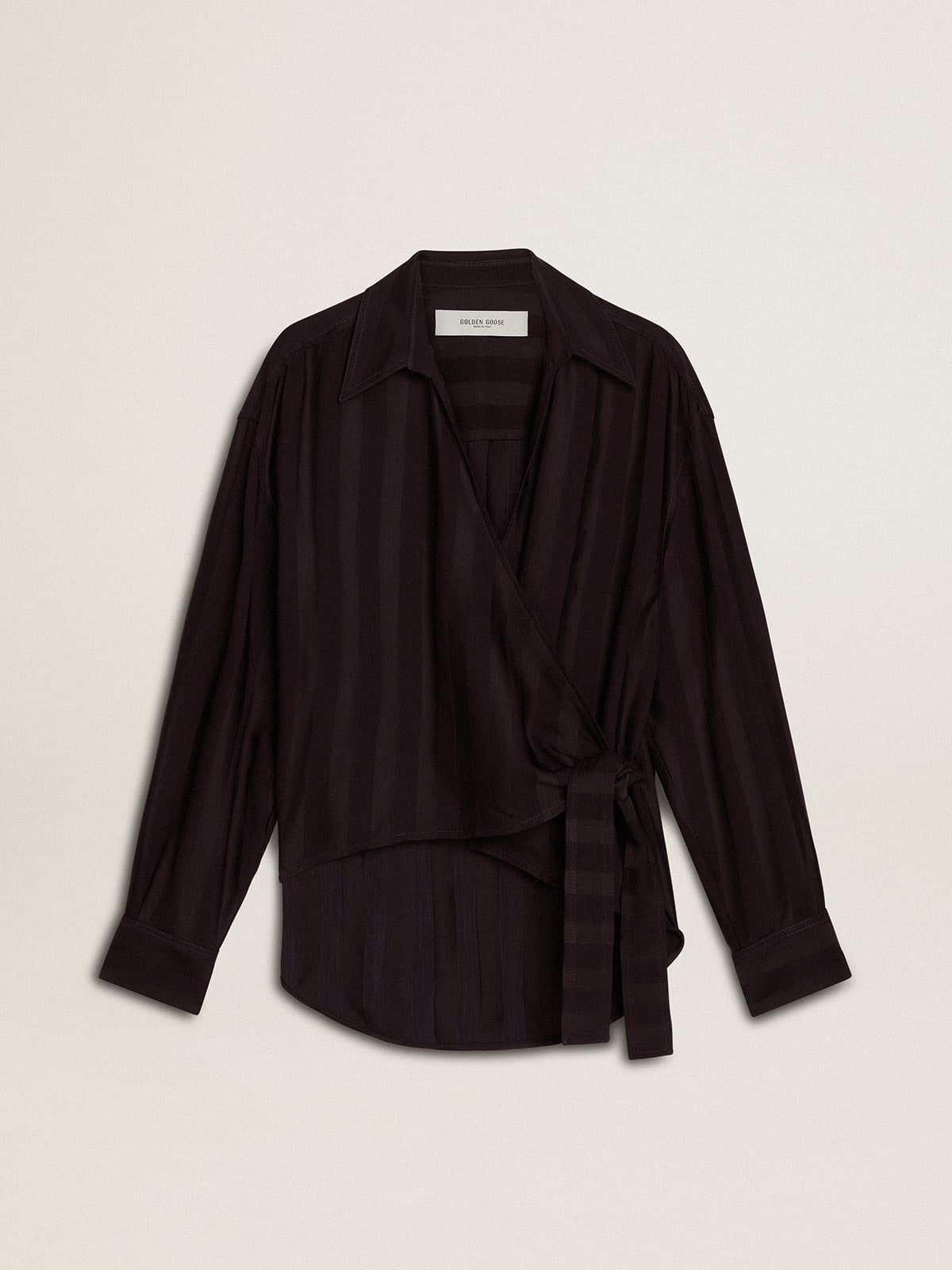 Women's black shirt with vertical stripes and side knot closure