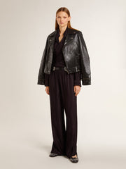 Women's black shirt with vertical stripes and side knot closure