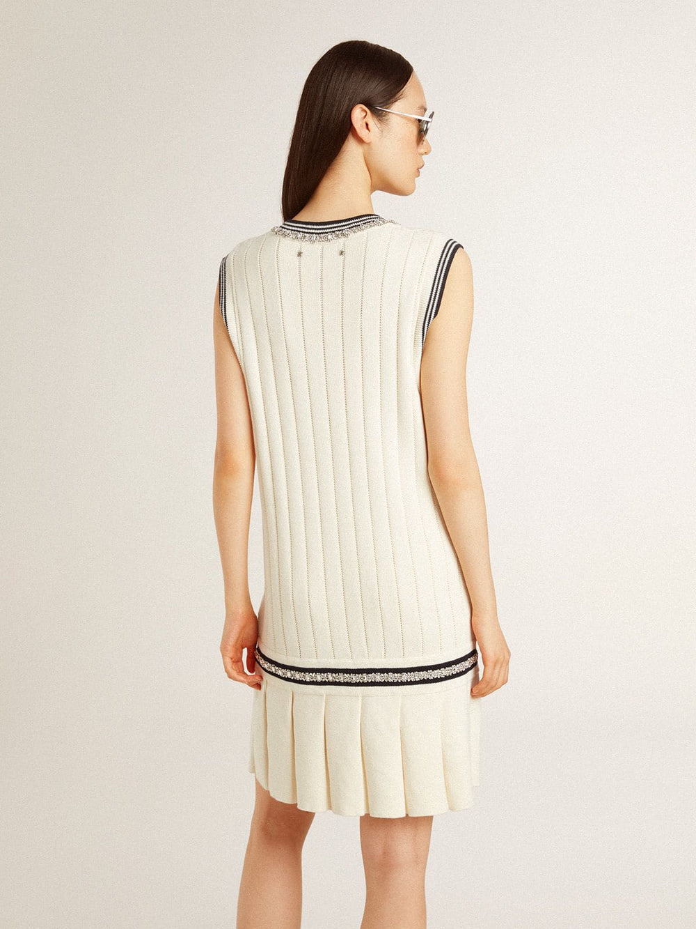 Women's worn-white cotton vest dress with dark blue ribbing and crystals