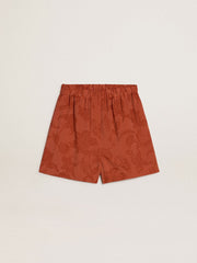 Women's shorts in brick-red jacquard with marine floral pattern