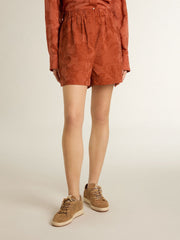 Women's shorts in brick-red jacquard with marine floral pattern
