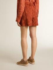 Women's shorts in brick-red jacquard with marine floral pattern