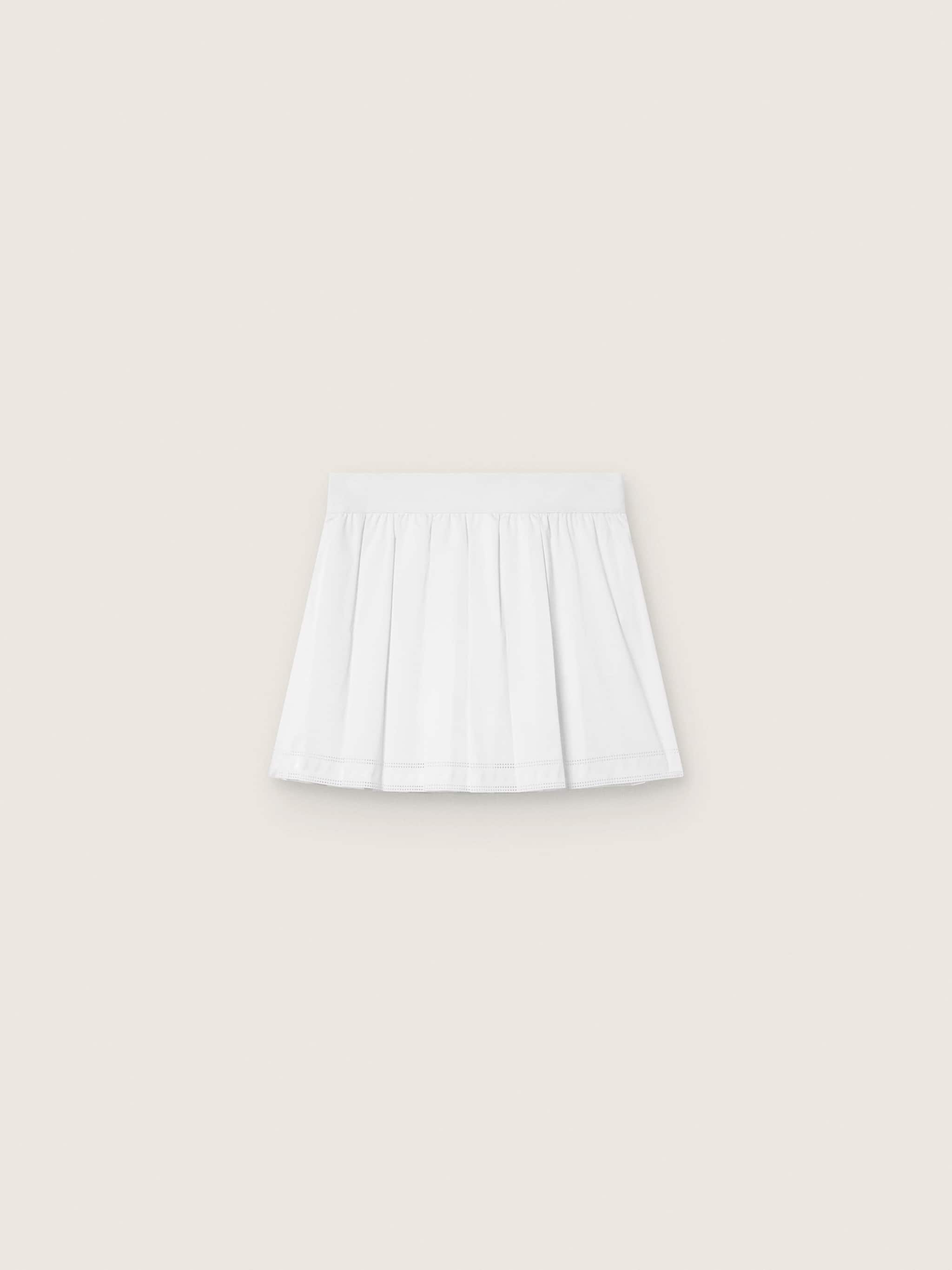 Pleated sports miniskirt in white