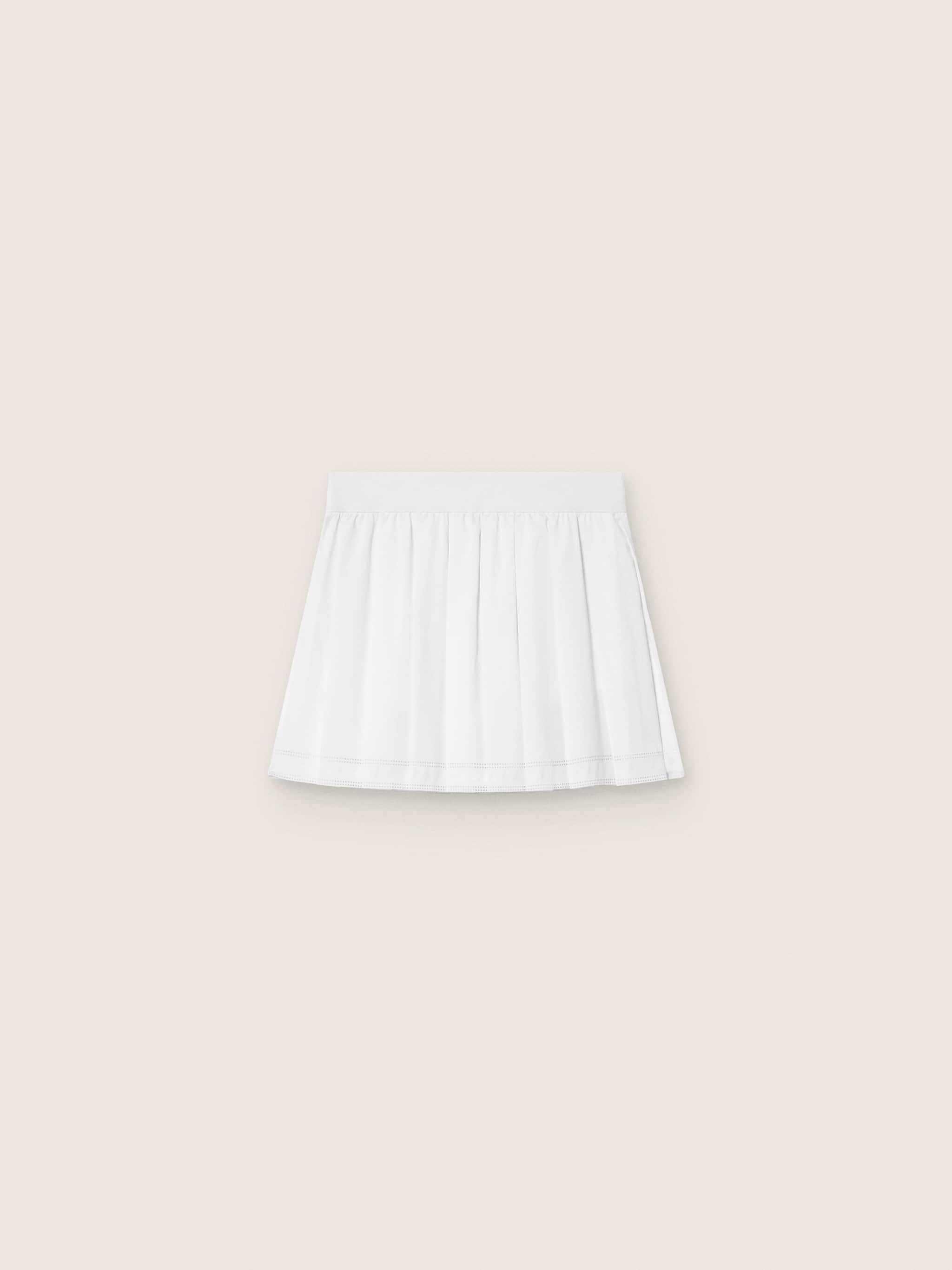 Pleated sports miniskirt in white