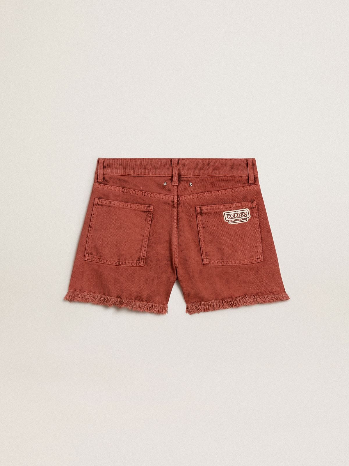 Women's shorts in brick-red denim with Golden Mediterraneo embroidery