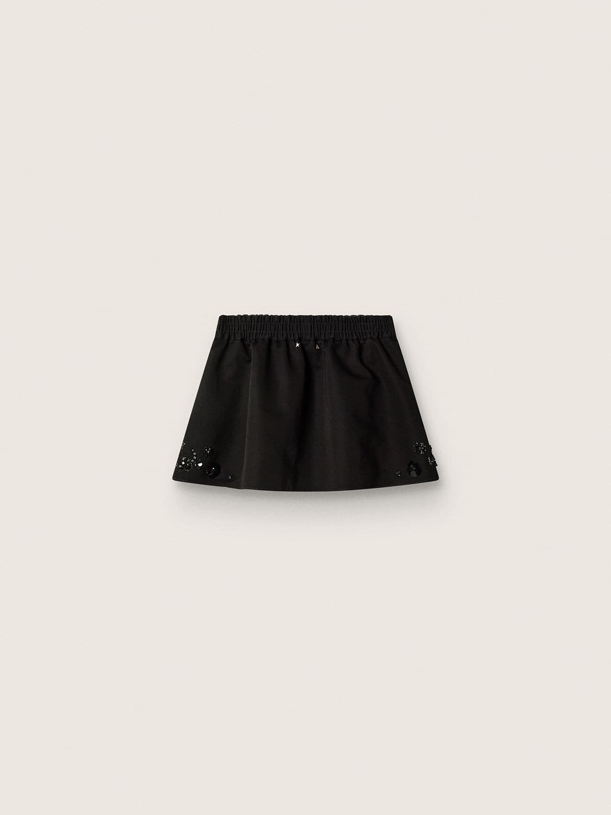 Women’s miniskirt in black cotton twill with floral sequin embroidery
