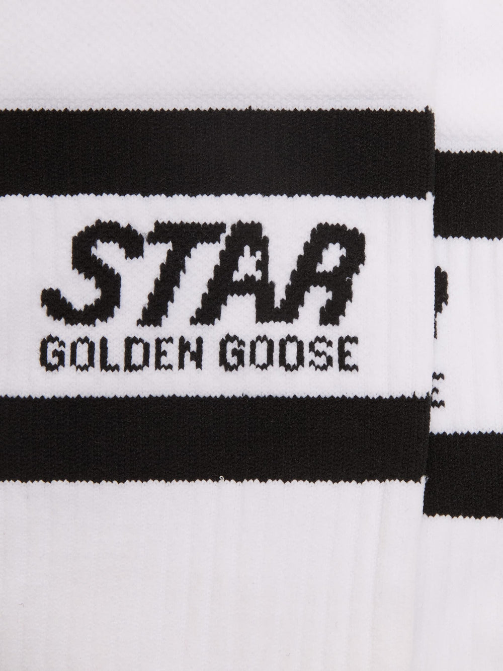 White sports socks with black stripes