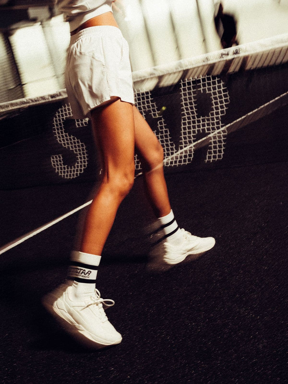 White sports socks with black stripes