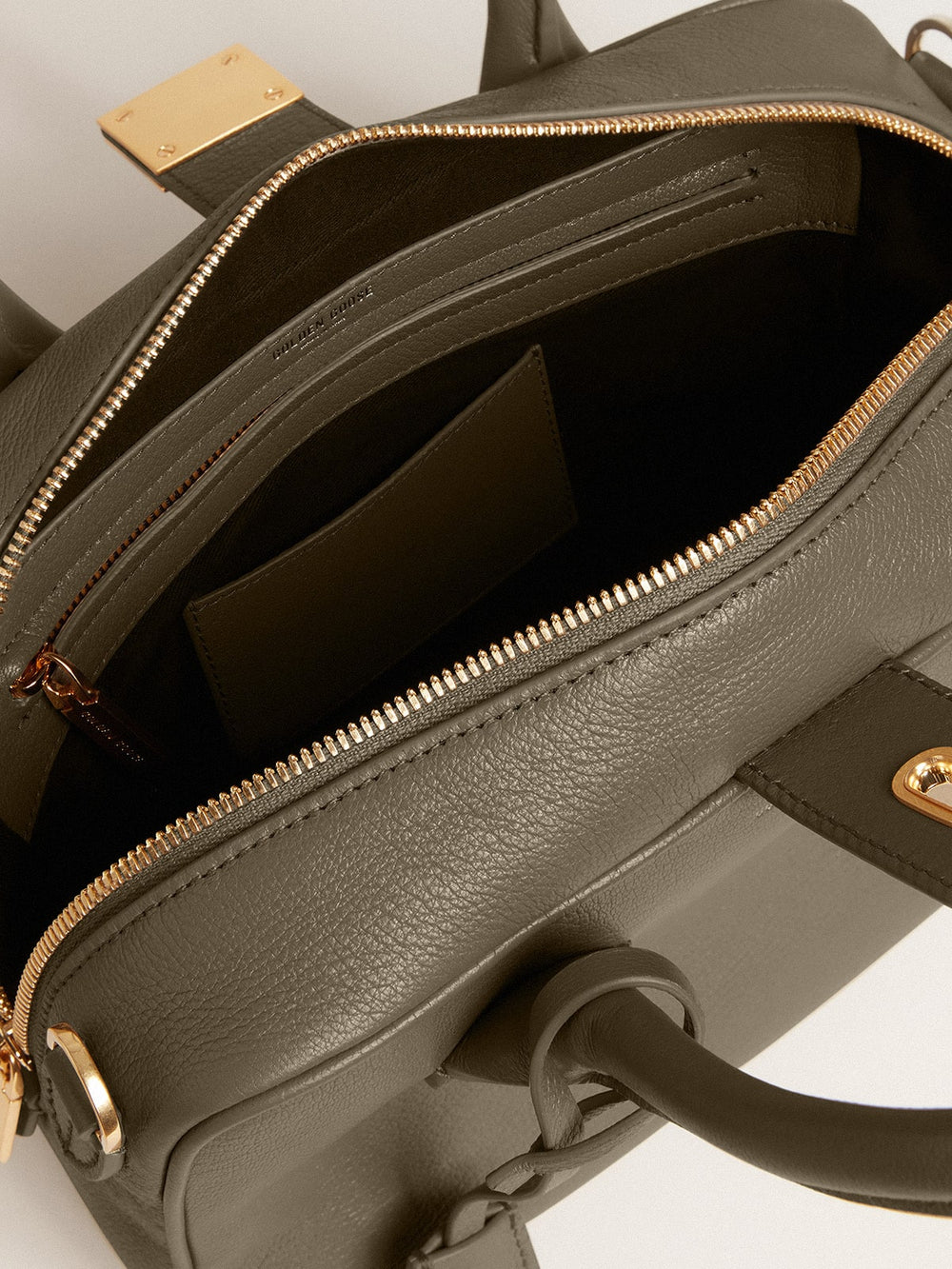 Vita Bag in sage-green leather with gold details