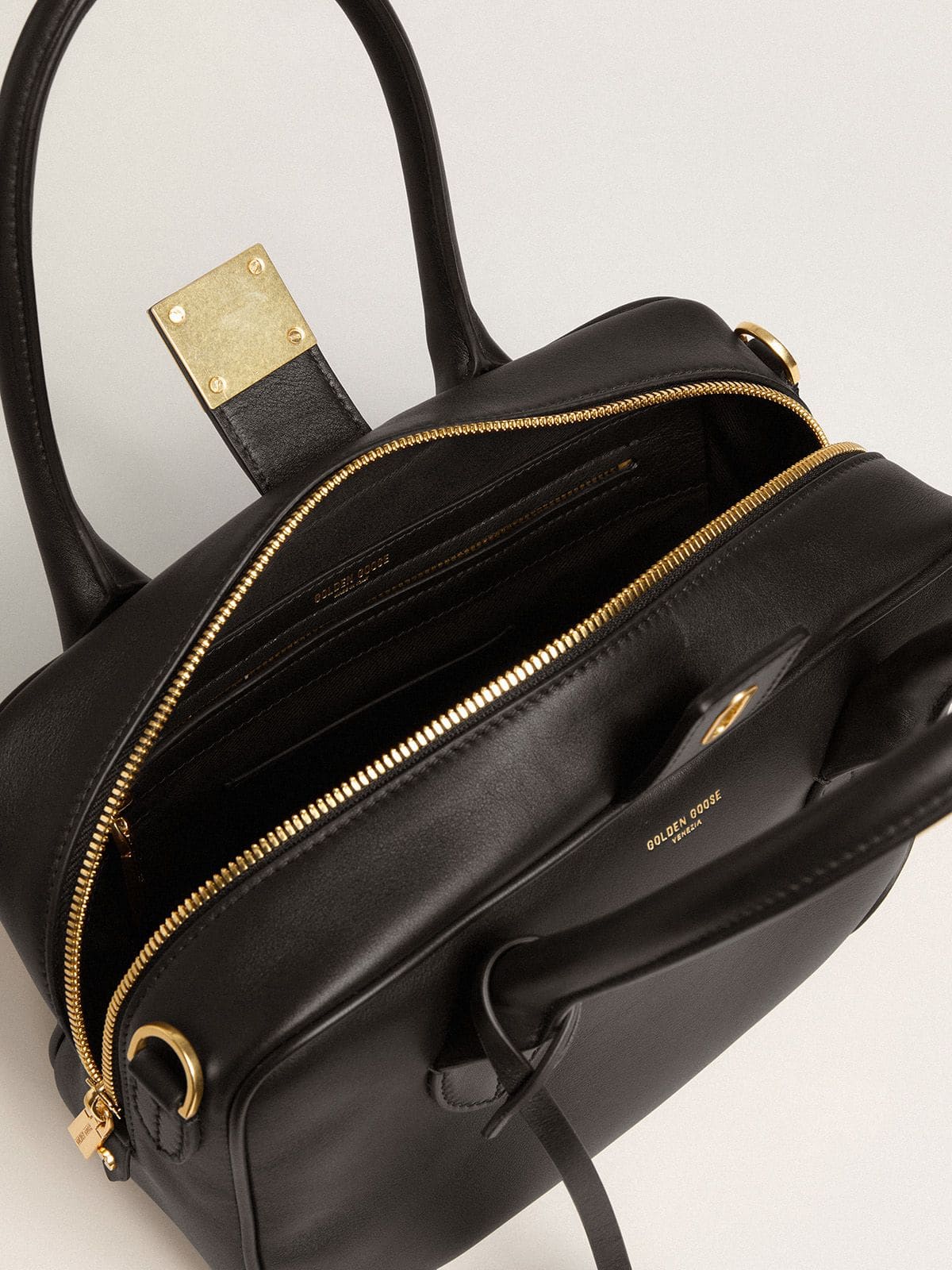 Vita Bag in smooth black leather with gold details
